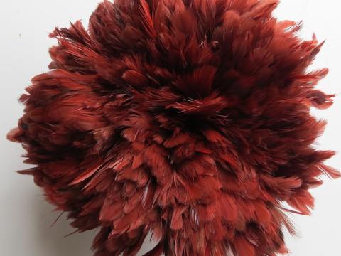 Caramel Cream Strung Feathers dyed deep red bulk