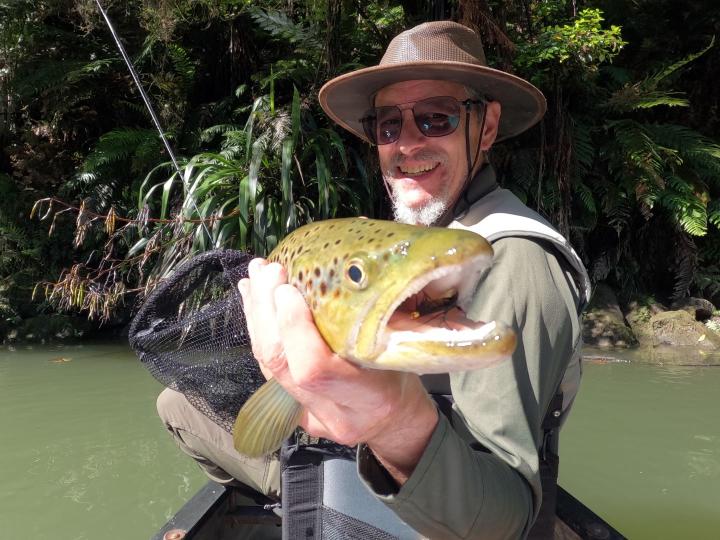 Brown on a bead head yellow and black woolly bugger