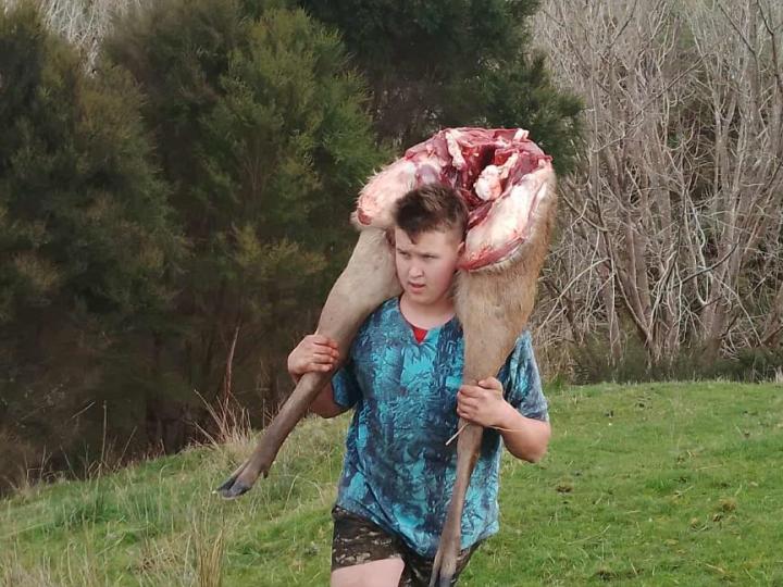 joel_carrying_sambar_legs.jpg