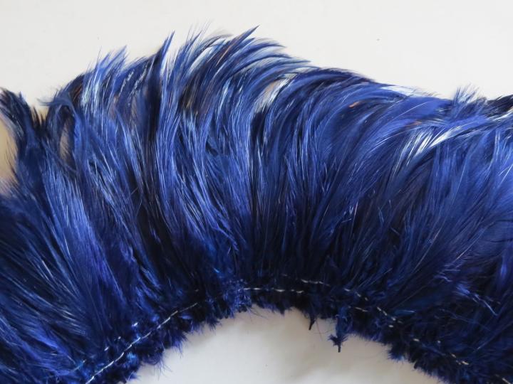 Dark blue strung rooster hackle closeup