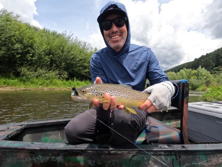 Brown on a deer hair cicada black with rubber legs