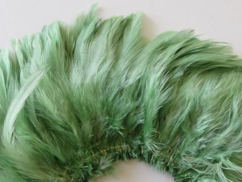 Lime Green Schlappen Strung Feathers Closeup