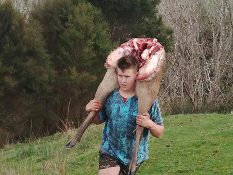 Joel carrying Sambar legs on Jerram's